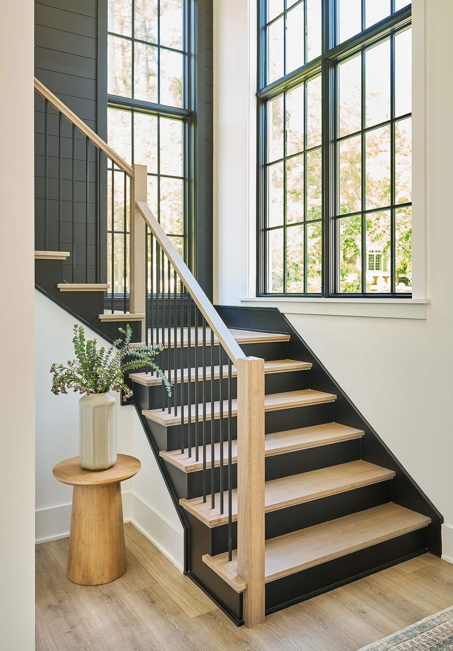 Staircase with black risers, custom home Charlotte NC