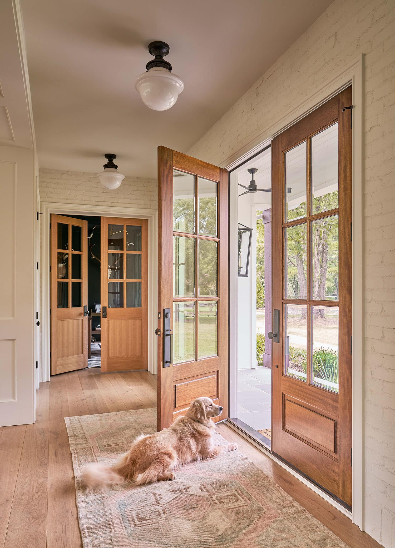 Wooden front doors with matching interior office doors in custom modern farmhouse Charlotte, NC