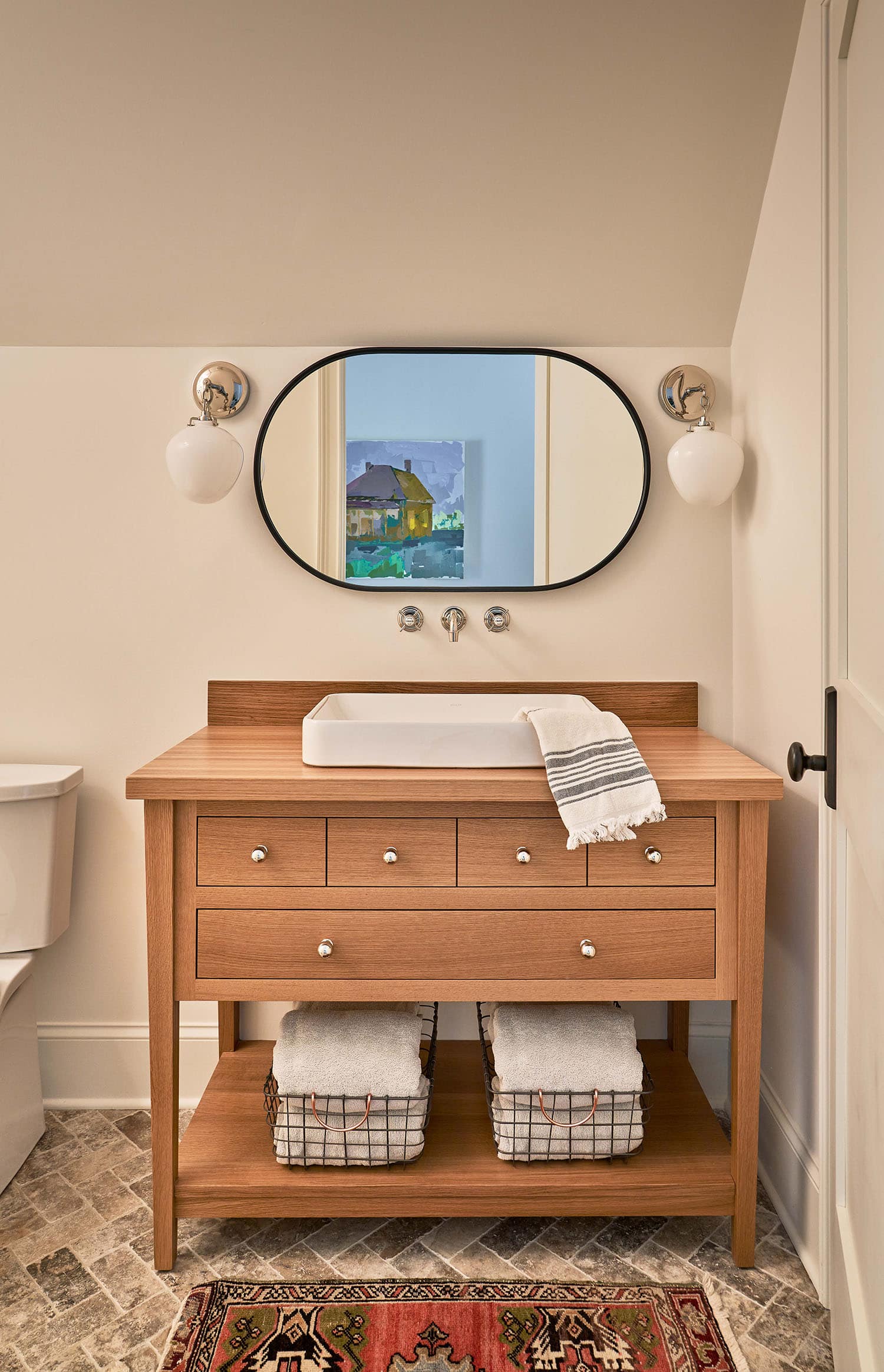 Guest bathroom with wooden vanity, modern farmhouse style in custom home Charlotte, NC