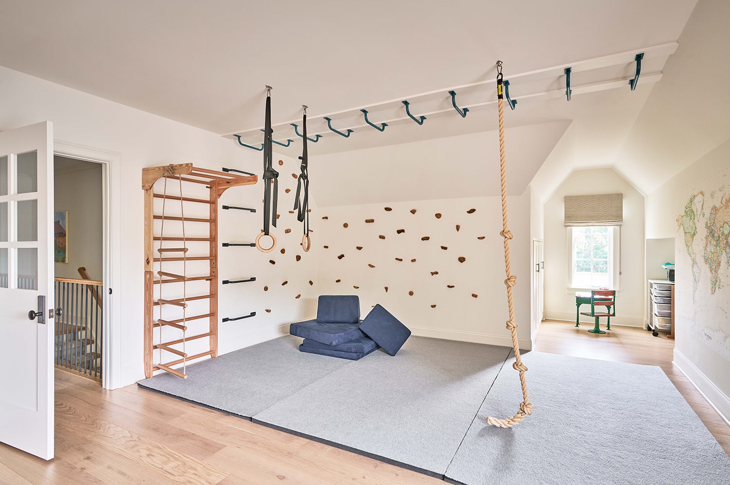 Children's playroom with climbing wall and jungle gym, custom home in Charlotte, NC