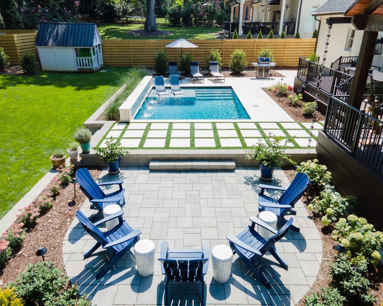 Hardscape patio and pool design in Charlotte backyard.